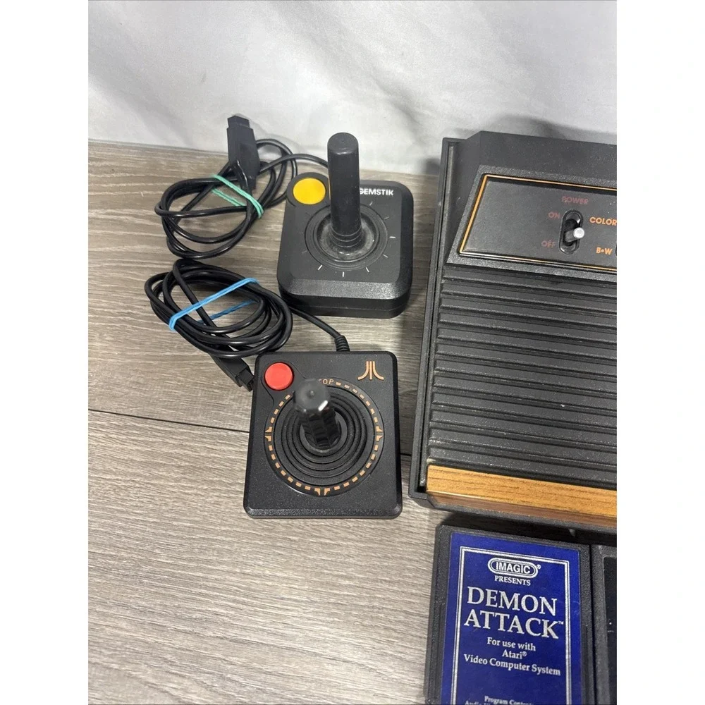 Atari 2600 4-Switch Woodgrain Console Bundle w/ 2 Joysticks, 4 Games Working